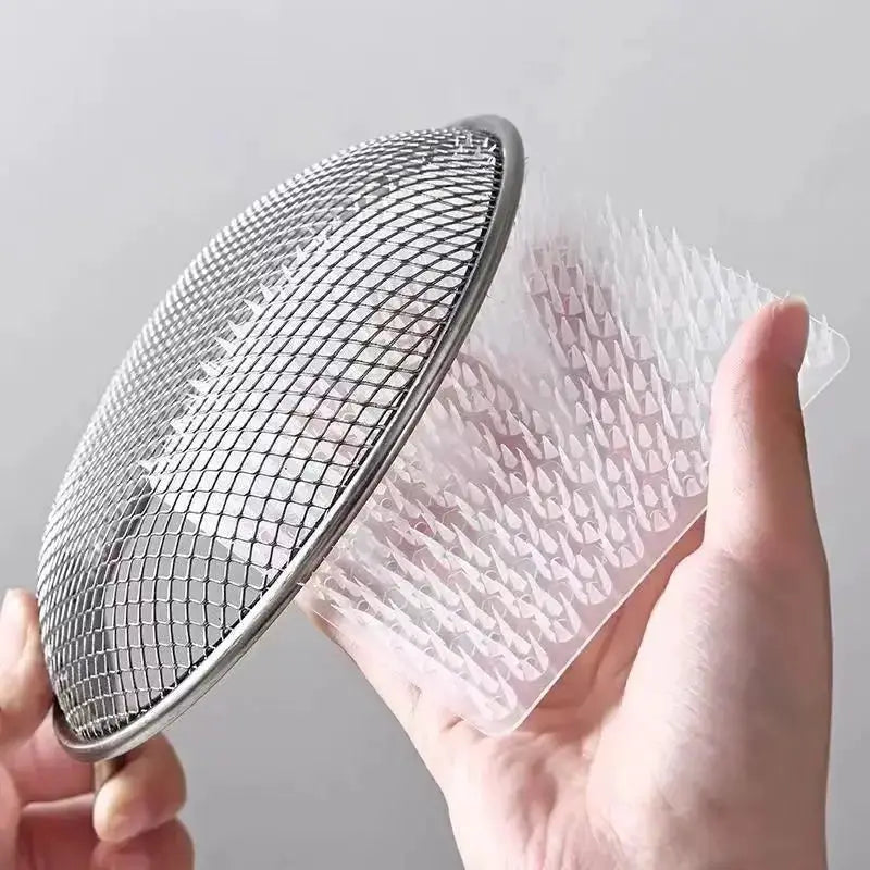 Silicone dish scrubber 2-piece set by Simples Market; round metal mesh frame with clear flexible bristle sheet