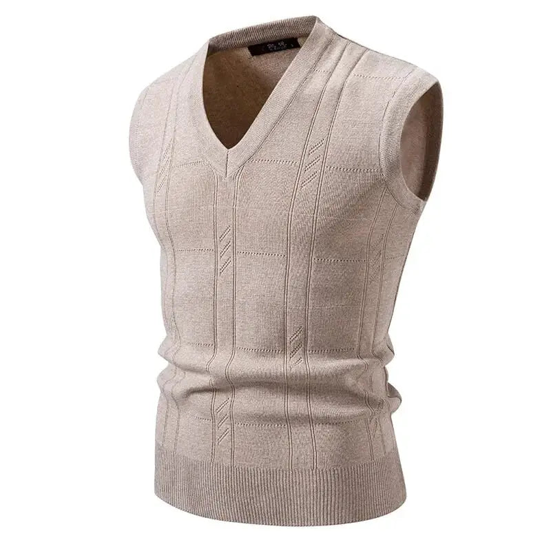 Beige lightweight sleeveless V-neck knit sweater vest with ribbed hem.
