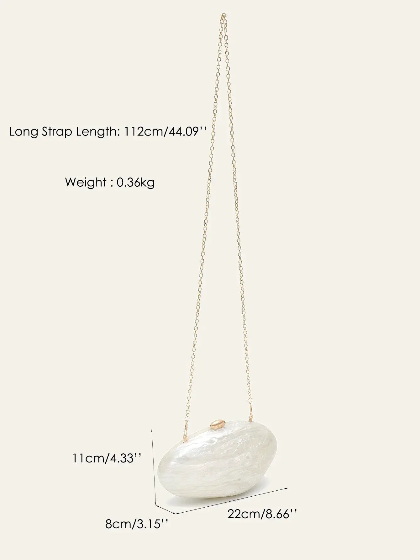 Shell-shaped acrylic evening clutch with a long gold chain and an off-white pearlescent finish.