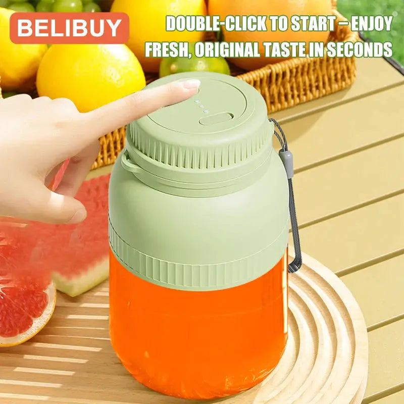 Portable electric juicer cup by BELIBUY with green lid and orange juice inside, USB powered