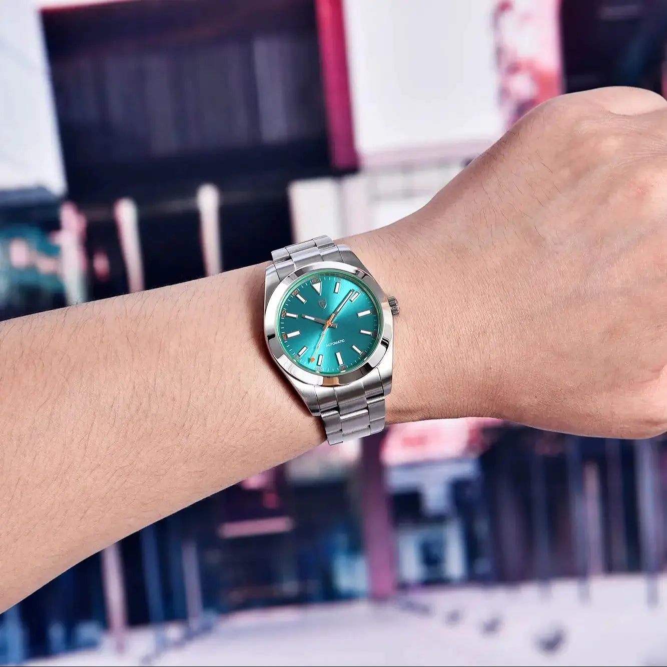 PAGANI DESIGN automatic wristwatch with a teal-green dial and stainless steel case and bracelet