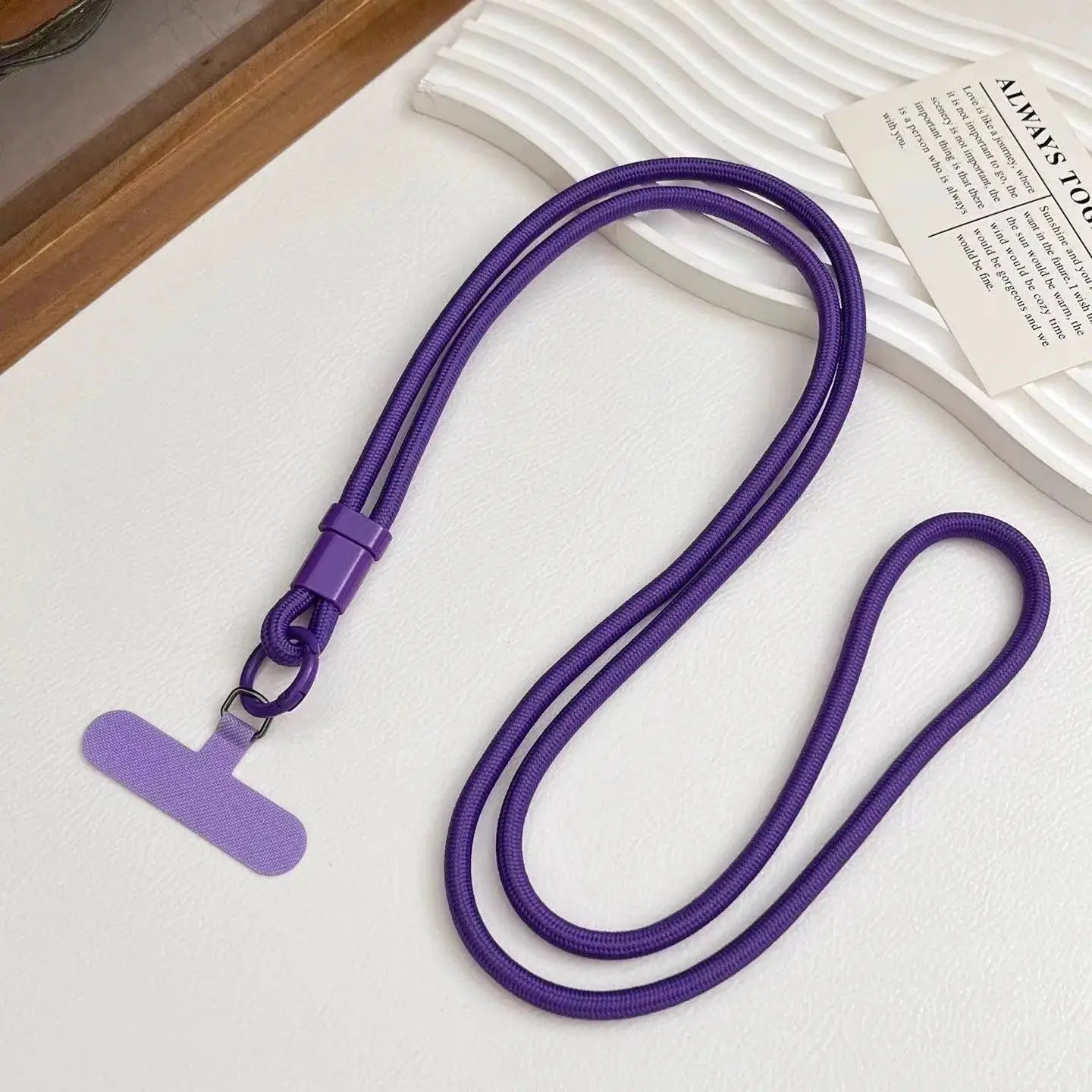 Purple solid-color phone lanyard with double rope strap and plastic clasp