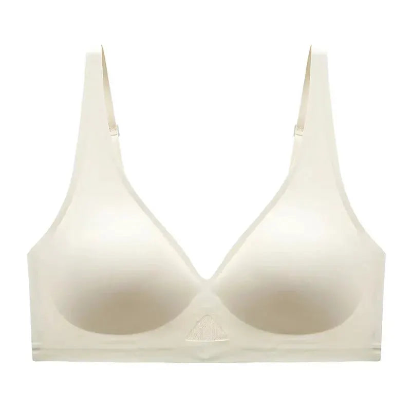 Women's seamless padded wireless bra in beige with wide straps.