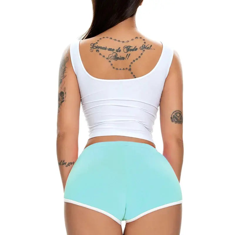 Simples Market women's turquoise shorts with white trim, back view