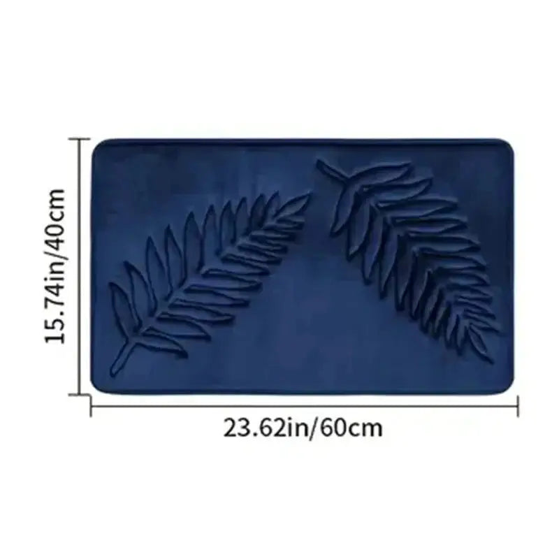 Blue memory-foam bath mat with embossed leaf pattern, 60x40 cm, washable bathroom rug.