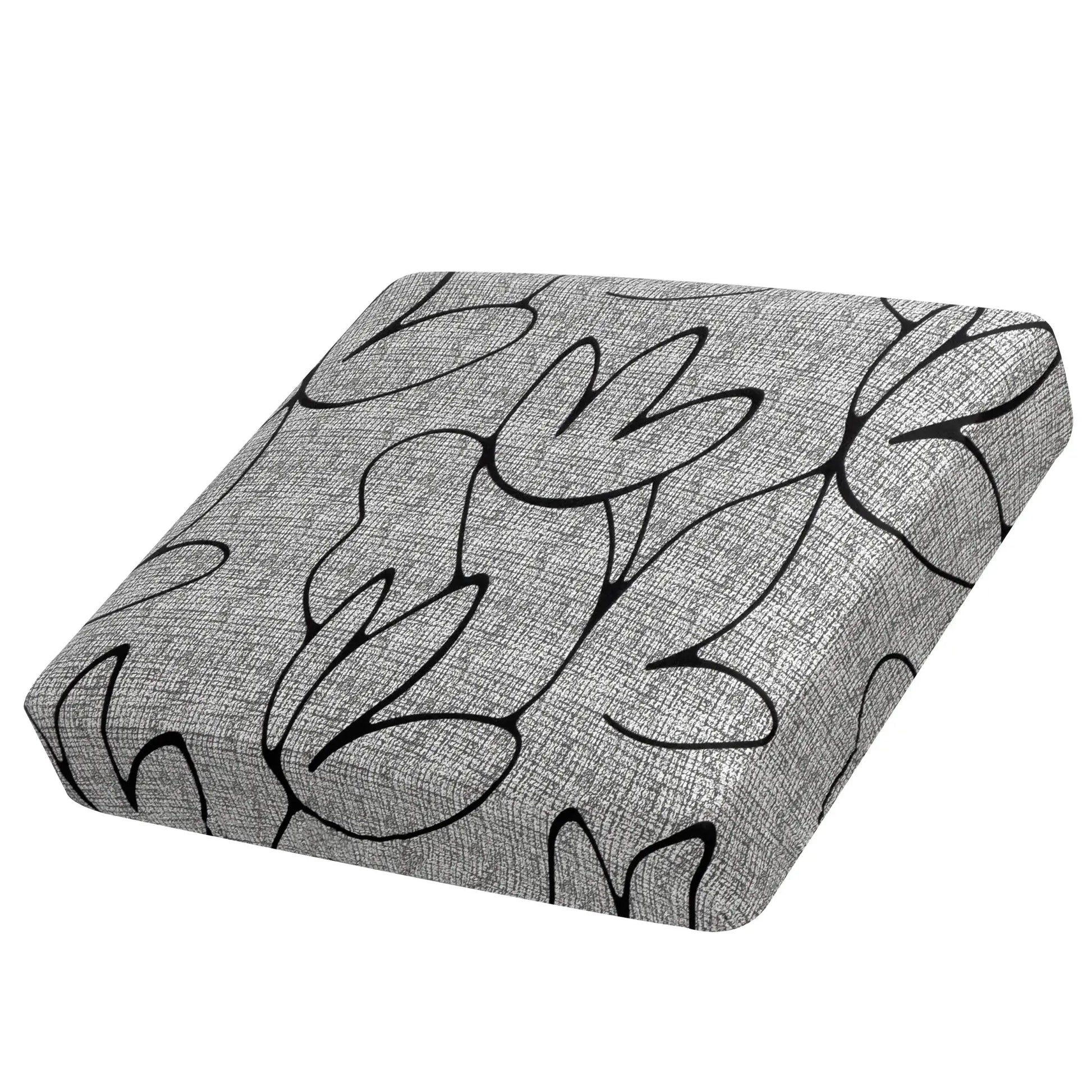 Elastic sofa seat cushion cover in gray fabric with black script-style pattern.