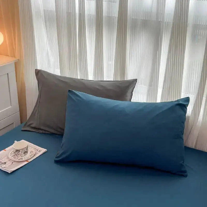 Simples Market 4-piece brush-fabric bedding set with blue duvet cover and gray pillowcases on bed