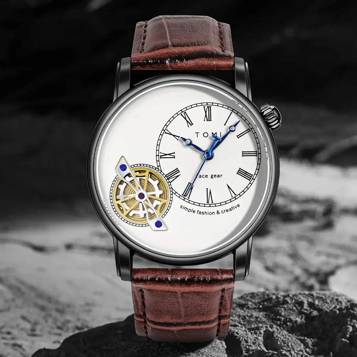 TOMI men's quartz watch with brown leather strap, white dial, blue hands, and visible gear.