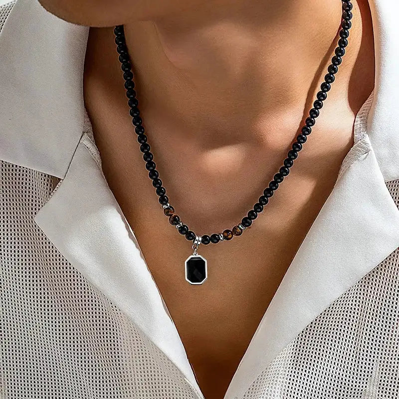 Salircon black tiger-stone beaded clavicle necklace with a silver-framed geometric pendant