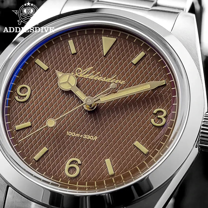 Addiesdive men's analog wristwatch with brown dial, luminous hands, stainless steel bracelet, 100m water resistant.