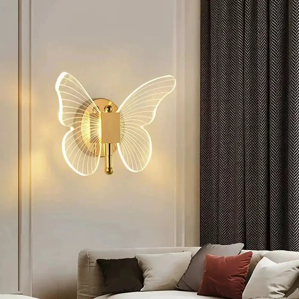 Butterfly LED wall lamp with gold metal body and acrylic wings, wall sconce by Simples Market