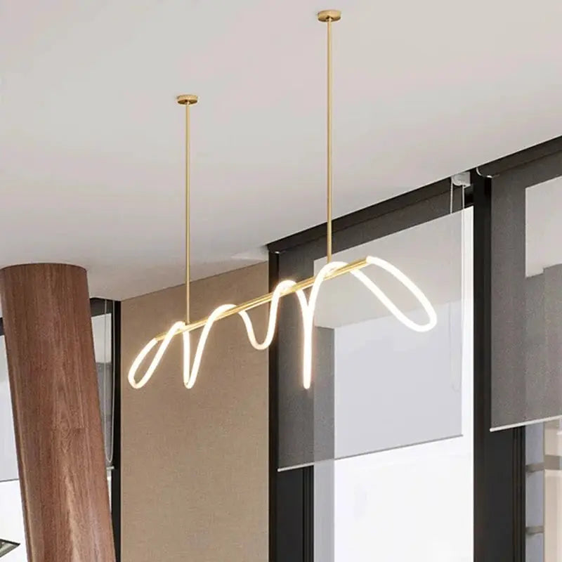 Nordic-style pendant light with a gold finish and a wavy LED tube for dining room ceiling