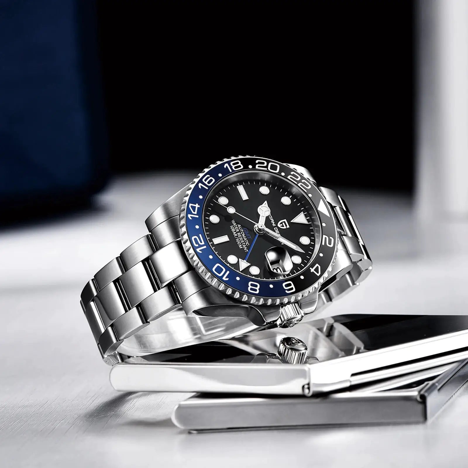 PAGANI DESIGN men's stainless steel GMT watch with blue-and-black bezel and sapphire glass