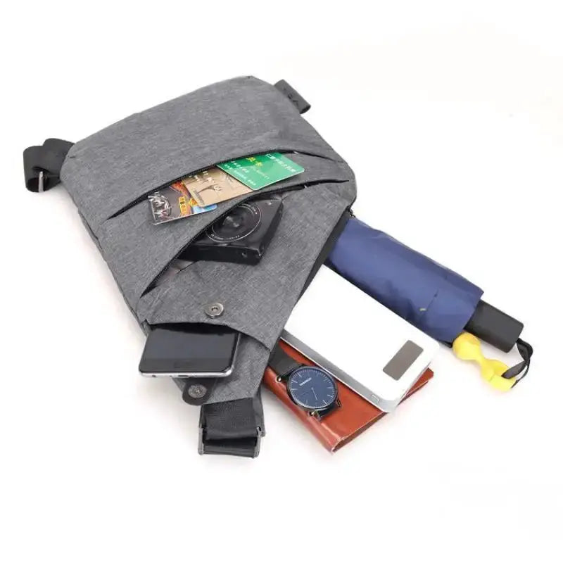 Crossbody chest bag by Simples Market in grey; waterproof with anti-theft design.