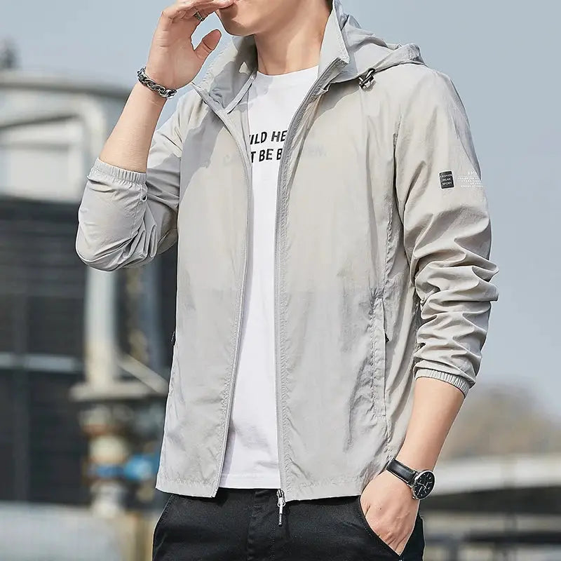 Hooded windbreaker jacket in light gray, waterproof quick-dry fabric for men and women by Simples Market