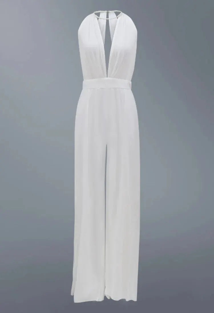 White halter-neck jumpsuit with deep V-neck, backless bodice and wide-leg pants