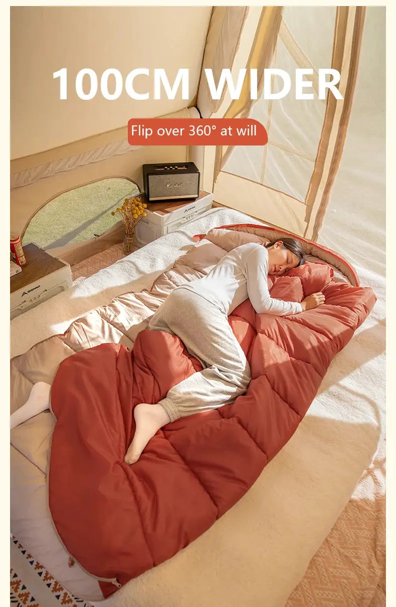 BISINNA large 3-season camping sleeping bag, rust-red long size for adults, inside a tent.