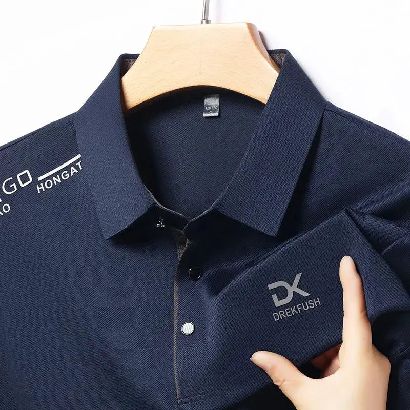 Men's navy polo shirt with DREKFUSH badge logo, short sleeves