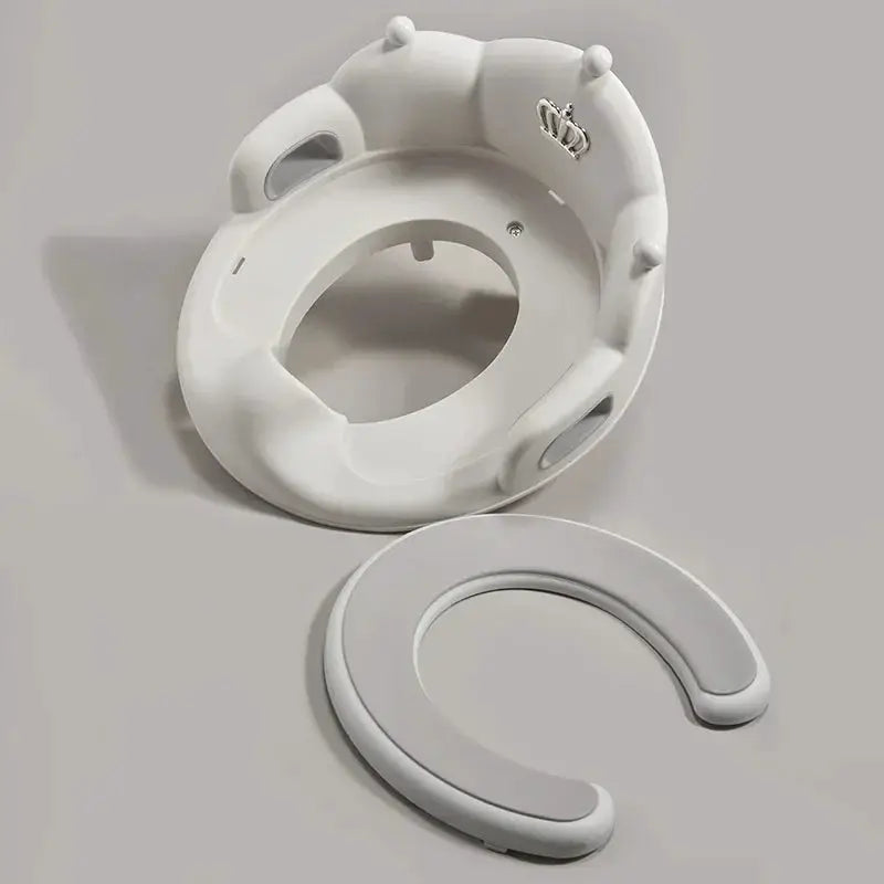 Baby and child toilet seat ring two-piece set by Simples Market, white plastic with cushioned insert