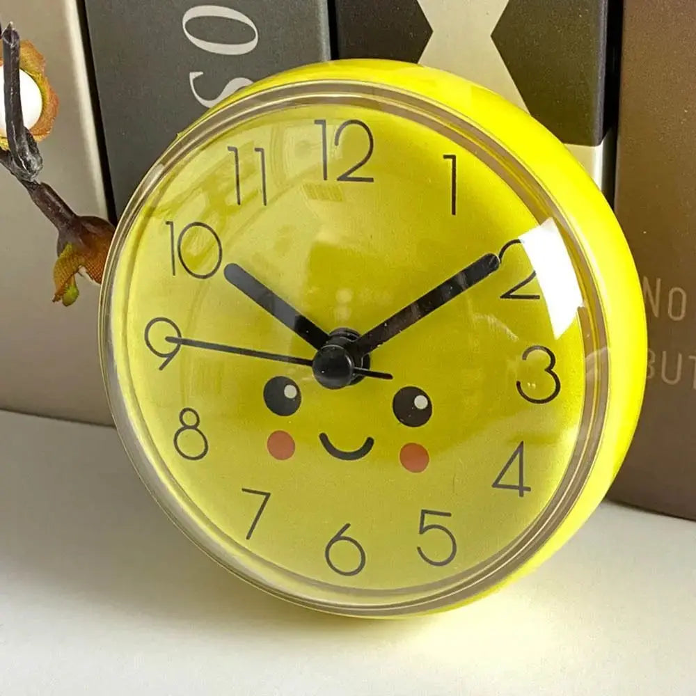 Mini yellow wall clock with kawaii face, bold black numbers, 7cm