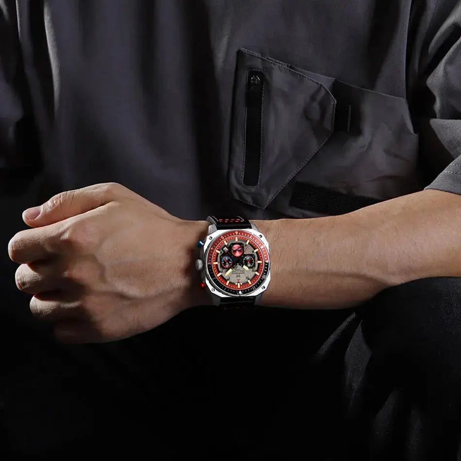 NAVIFORCE men's sports multifunction waterproof watch on wrist, stainless steel case, red dial accents, black strap.