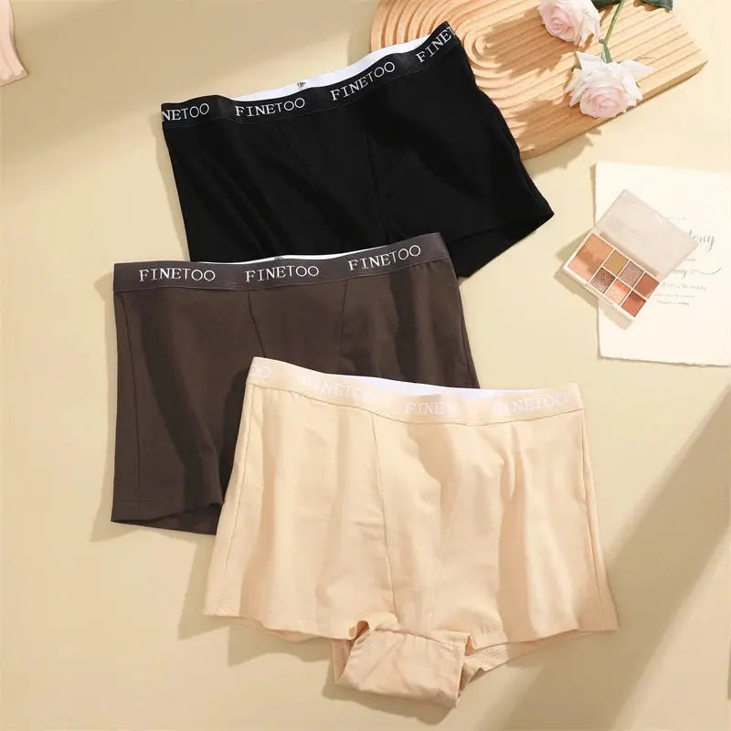 Three-pack women's cotton seamless panties with FINETOO waistband in black, brown, and beige
