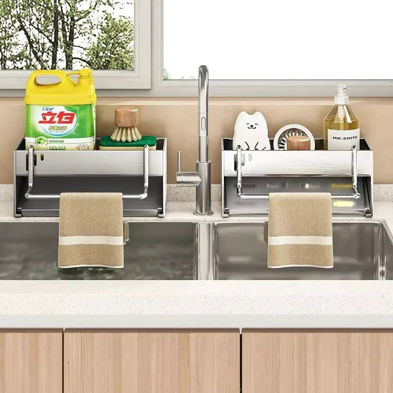 Stainless steel sponge rack set for double sink with towel bar; holds detergent bottle, sponge, brush.