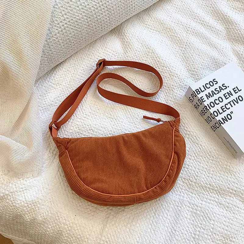 Corduroy hobo shoulder bag for women in orange with adjustable crossbody strap