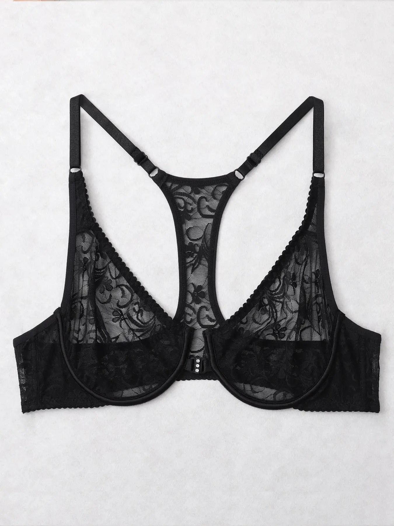 Black lace bralette with sheer floral cups and adjustable straps