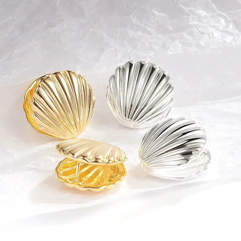 Ocean shell texture stud earrings by Simples Market; gold and silver tones, 4-piece set