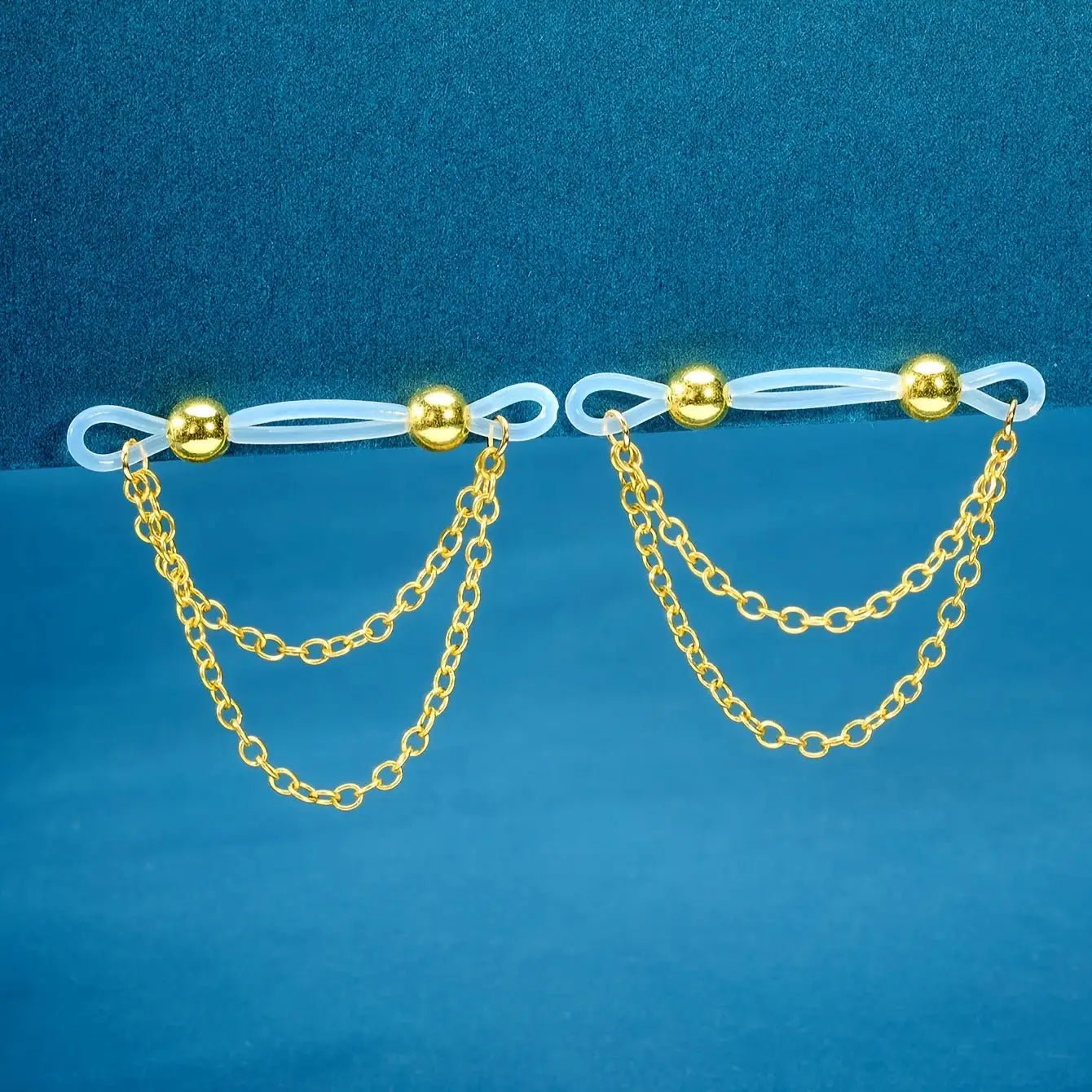 1 pair of adjustable fake nipple rings with white acrylic loops, gold beads, and dangling gold chains, Simples Market