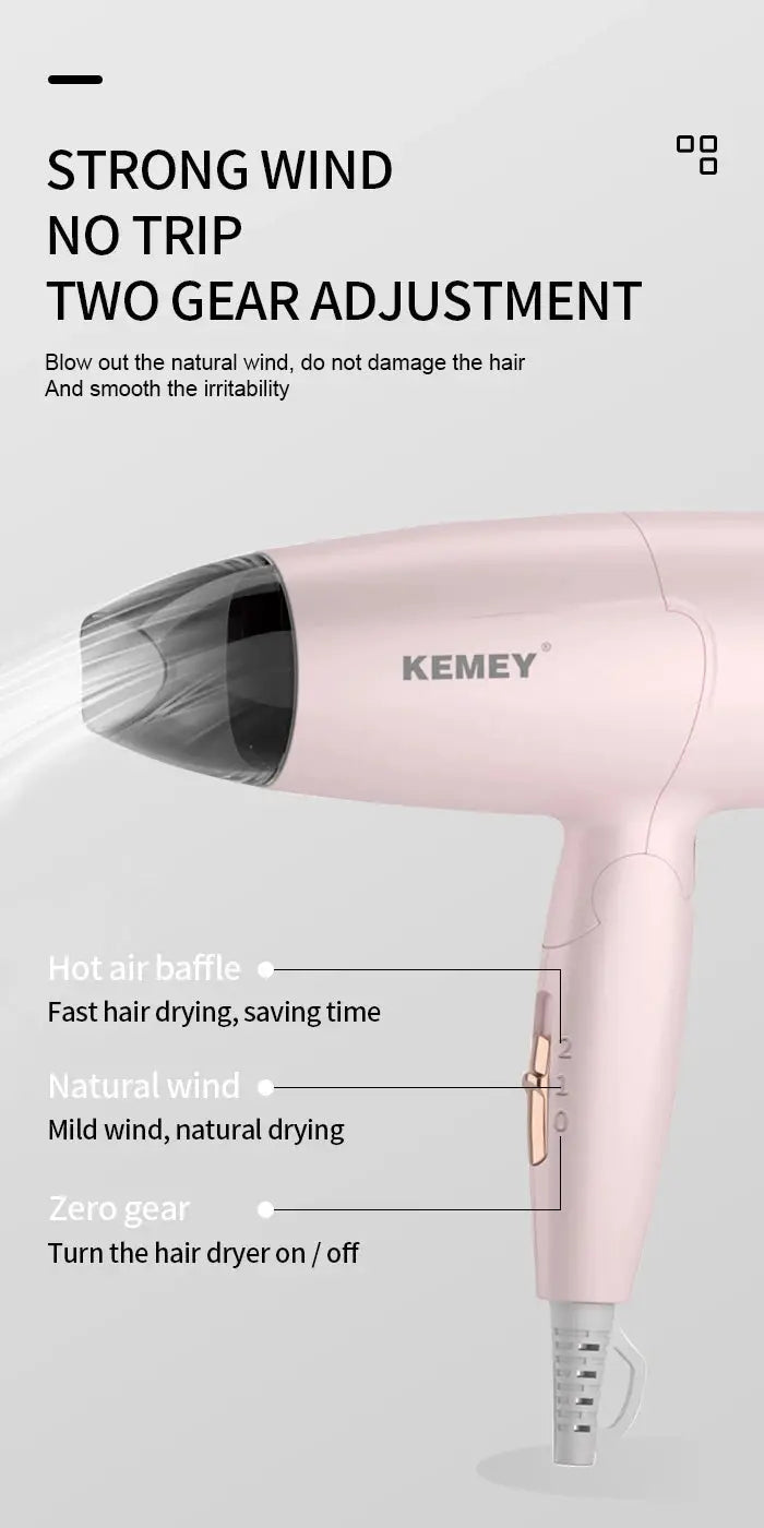 KEMEY pink portable hair dryer with foldable handle and two-speed settings, 950W