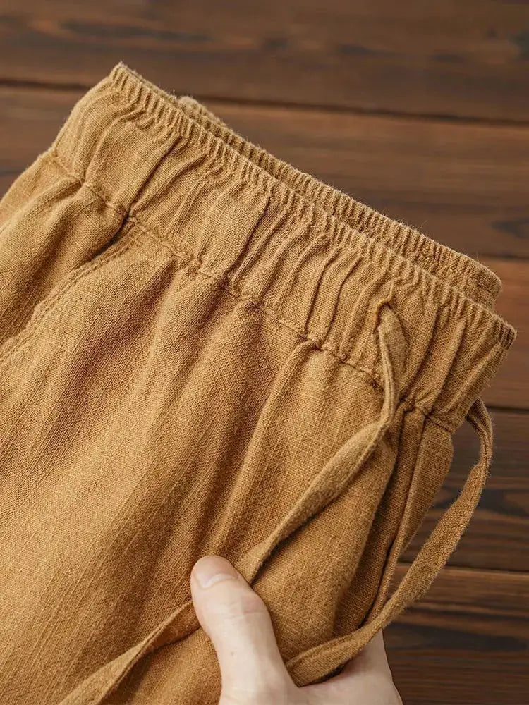 Casual cotton-linen men's chino pants, tan baggy wide-leg with elastic waistband and drawstring