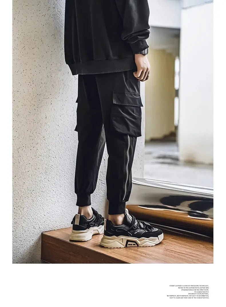 New Men's Casual Sneakers by Simples Market, black low-top with chunky beige sole.