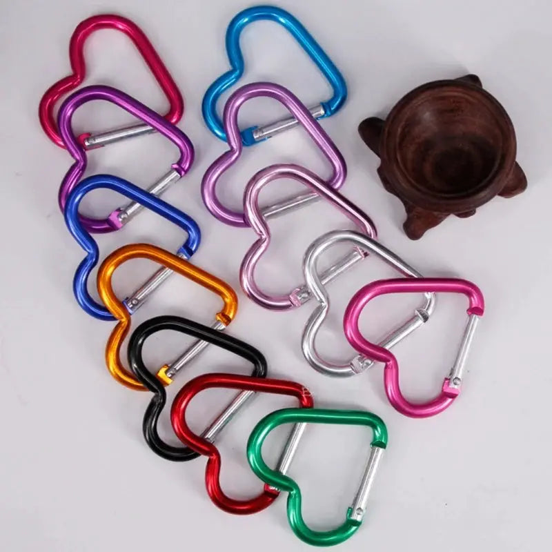 12 aluminum alloy heart-shaped carabiner keychains with spring-locking gates in assorted colors
