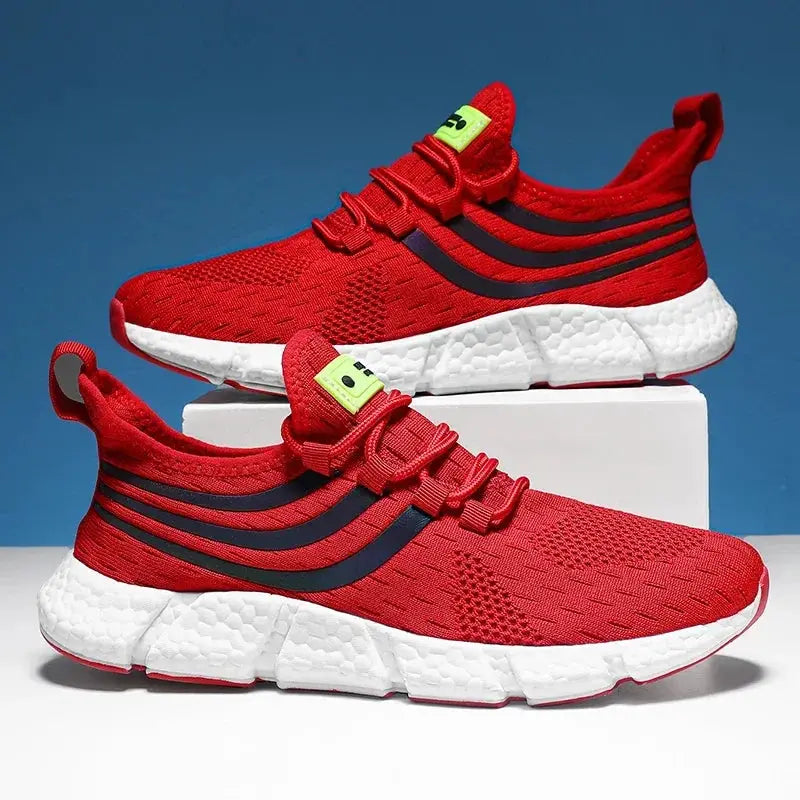 Pair of men's red breathable platform sneakers with black stripes and white soles