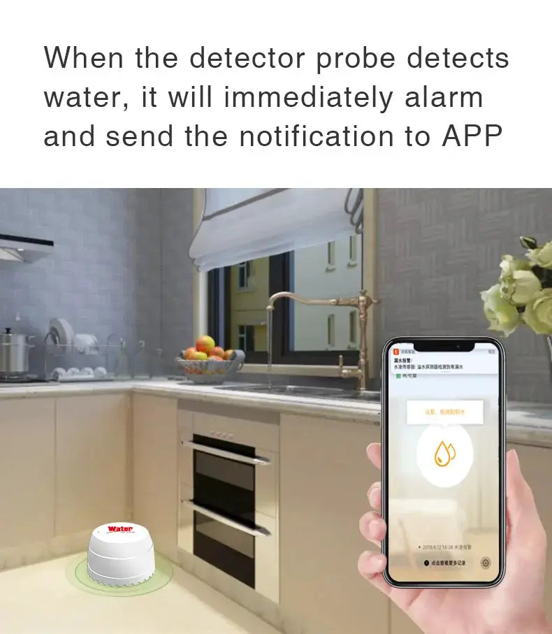 Tuya WiFi water leak detector, white, placed in a modern kitchen with smartphone app flood alert