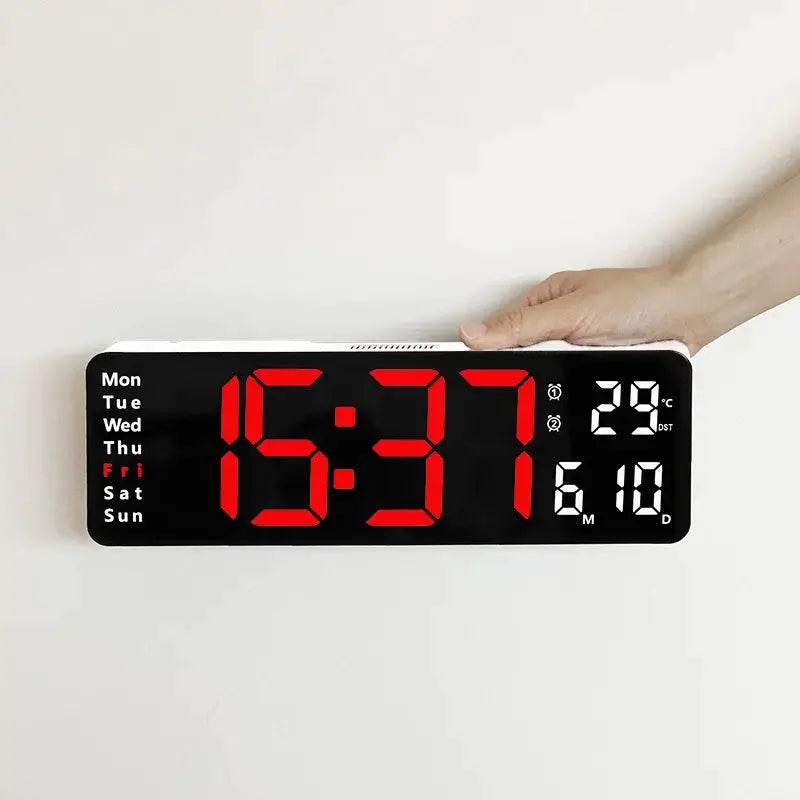 Large black digital wall clock with red LED display, weekday list on left and temperature/date on the right.