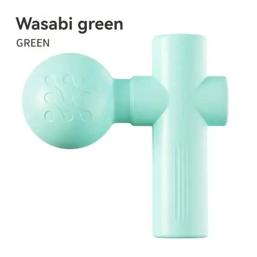 Mini massage gun in wasabi green with round head attachment, compact portable fascia machine.