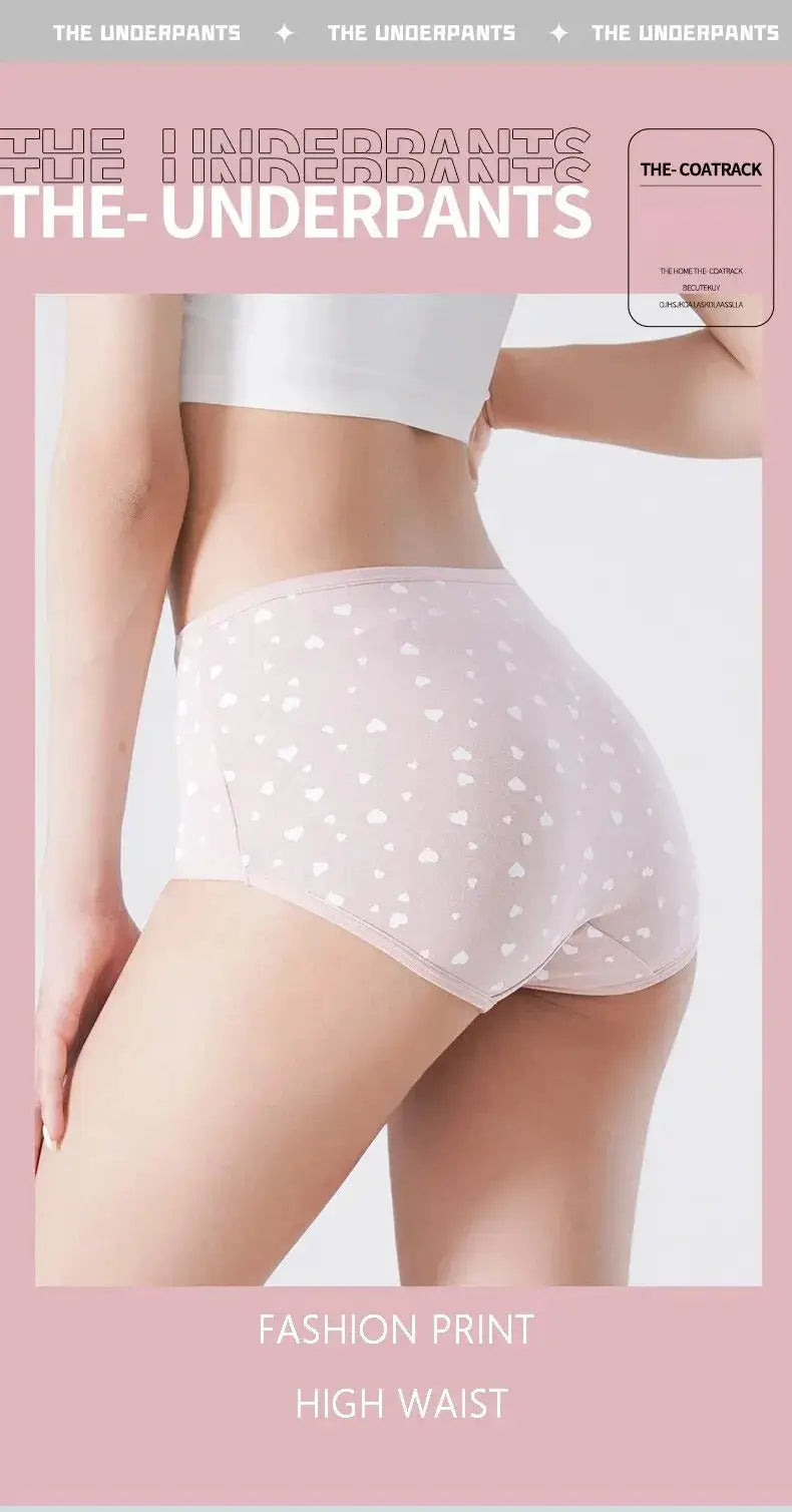 Women's high-waist panties in pink with white heart print; breathable cotton fabric.