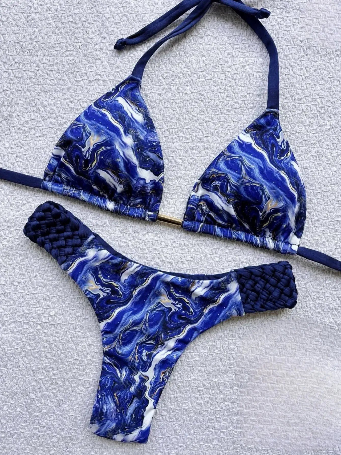 RUOTONSEPT print halter bikini set in blue marbled pattern with triangle top and high-cut thong bottoms