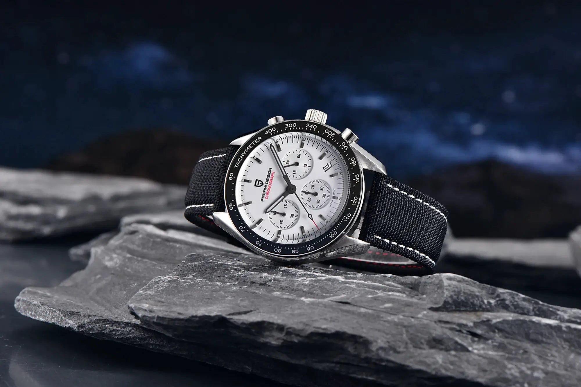 Pagani Design men's wristwatch with white chronograph dial, tachymeter bezel, silver case and black fabric strap