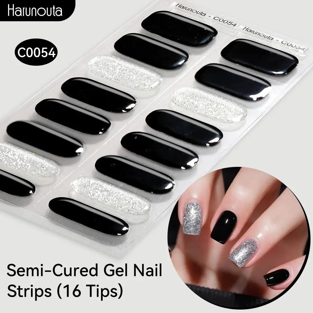 Gradient Auroras Semi-Cured Gel Nail Strips by Haunouta: black glossy and silver glitter tips, 16 tips