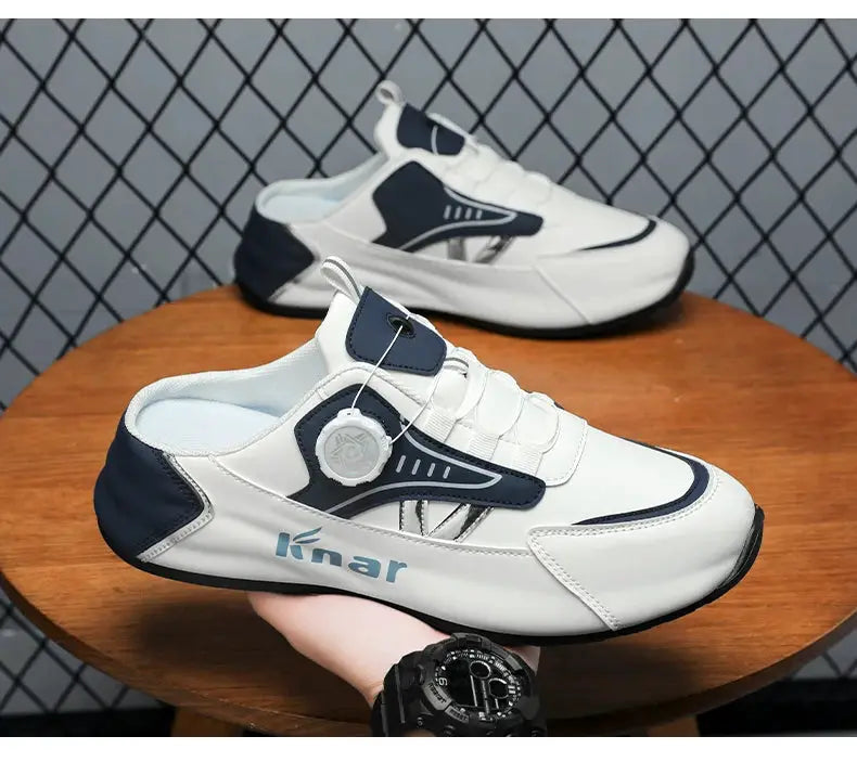 Pair of men's white and navy lightweight running shoes with breathable upper and non-slip sole