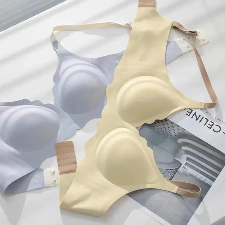 No Trace Top wireless bras by Simples Market in pale yellow and light blue; two adjustable back-sling bras