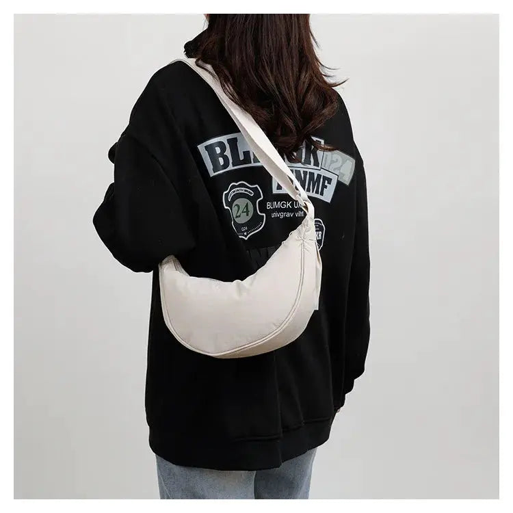 Nylon crescent crossbody bag in beige, unisex design with zipper and large capacity