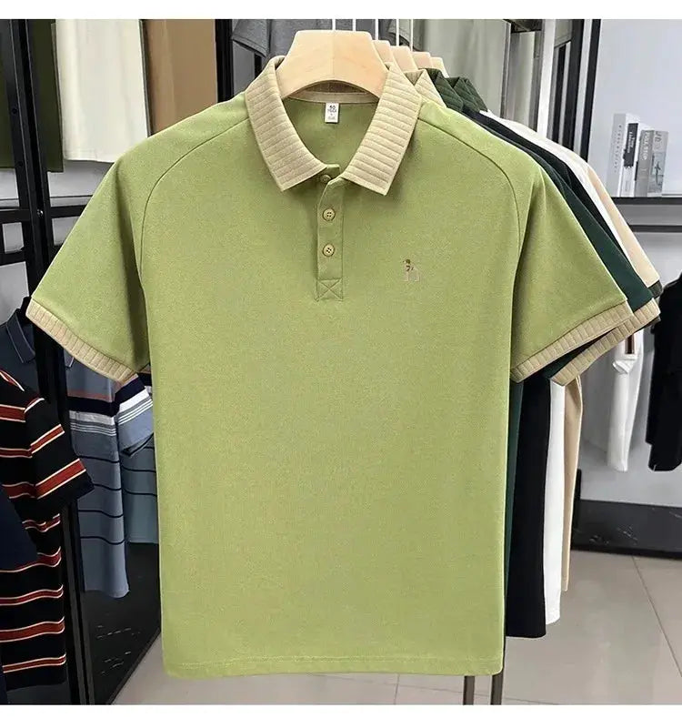 Men's short-sleeve polo shirt, light-green with beige ribbed collar and cuffs, small dog embroidery.