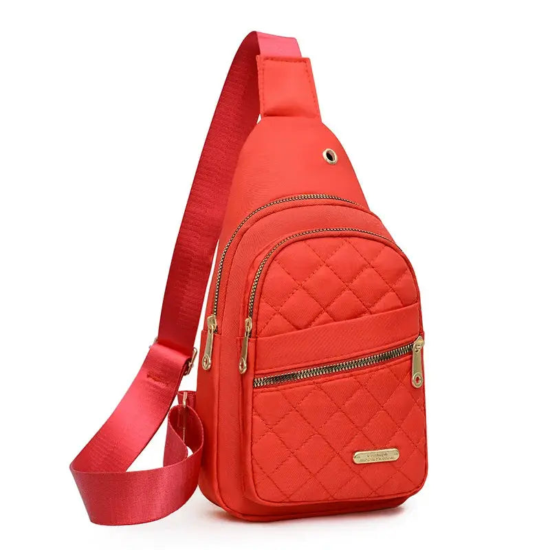 Simples Market red quilted chest bag with multi-pocket design and crossbody strap