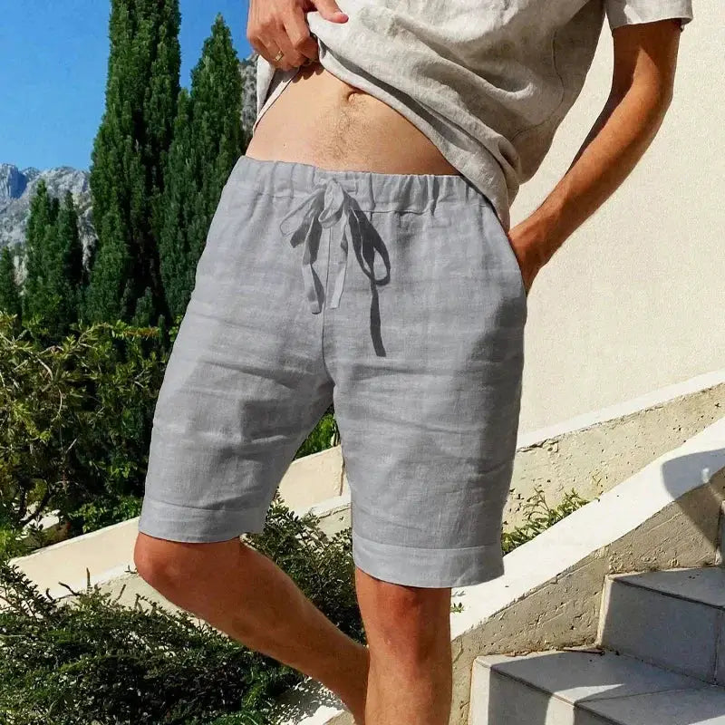 Men's gray cotton-linen breathable shorts with drawstring waist, Simples Market Hawaii streetwear style.