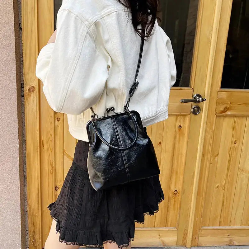 Handbag black PU leather with top handle and crossbody strap